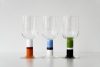 Gunnar Cyrén Popglas collection featuring handcrafted glass with colorful striped stems and clear bowls