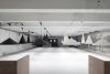 Complete W221 pendant installation showing multiple cone sizes and dramatic spatial lighting effects