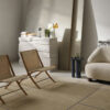 &tradition X lounge chair by Hvidt & Mølgaard featuring laminated oak frame and natural rattan seat