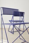 X-Line chair by Niels Jørgen Haugesen for Magnus Olesen featuring minimalist tubular steel construction
