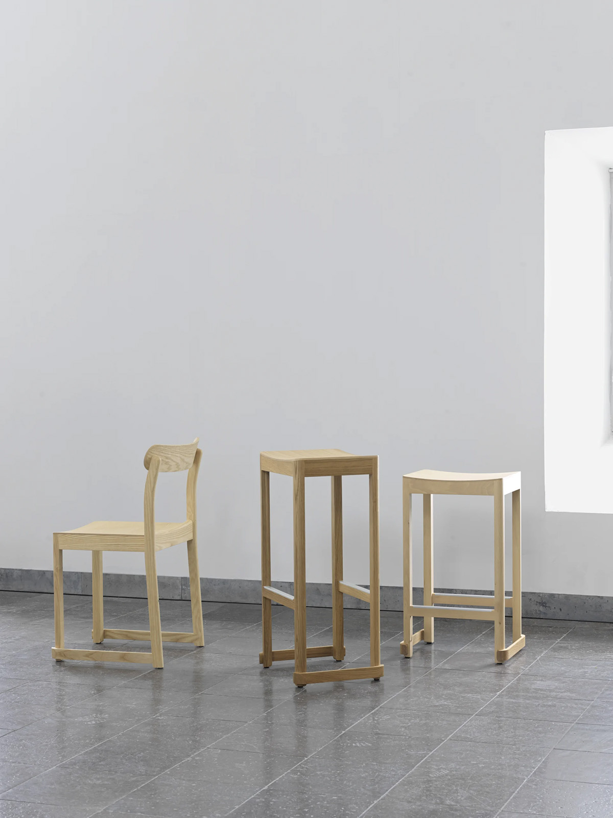 Atelier bar stool by TAF Studio for Artek featuring geometric lines and aluminum footrest reinforcement