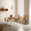 Børge Mogensen's BM0121 circular coffee table reissued by Carl Hansen & Søn featuring timeless Danish design and craftsmanship