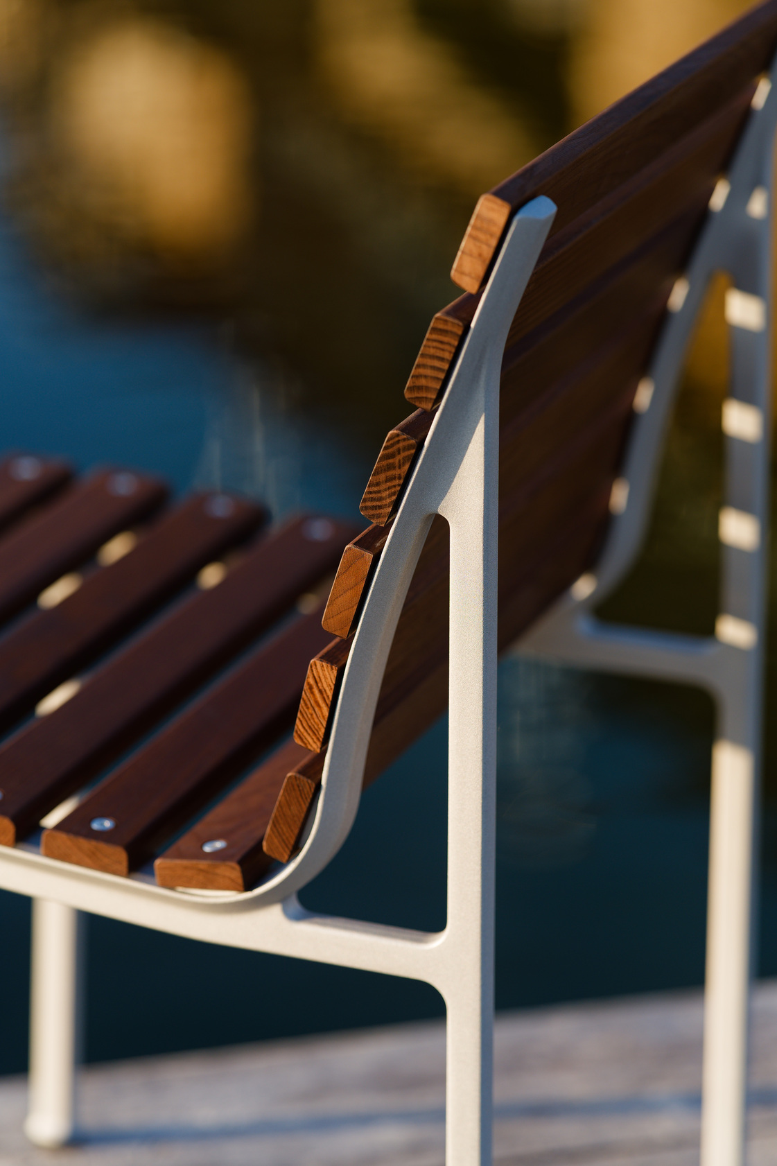 Detail of Traverse stool showing the craftsmanship of heat-treated ash slats and aluminum frame connection