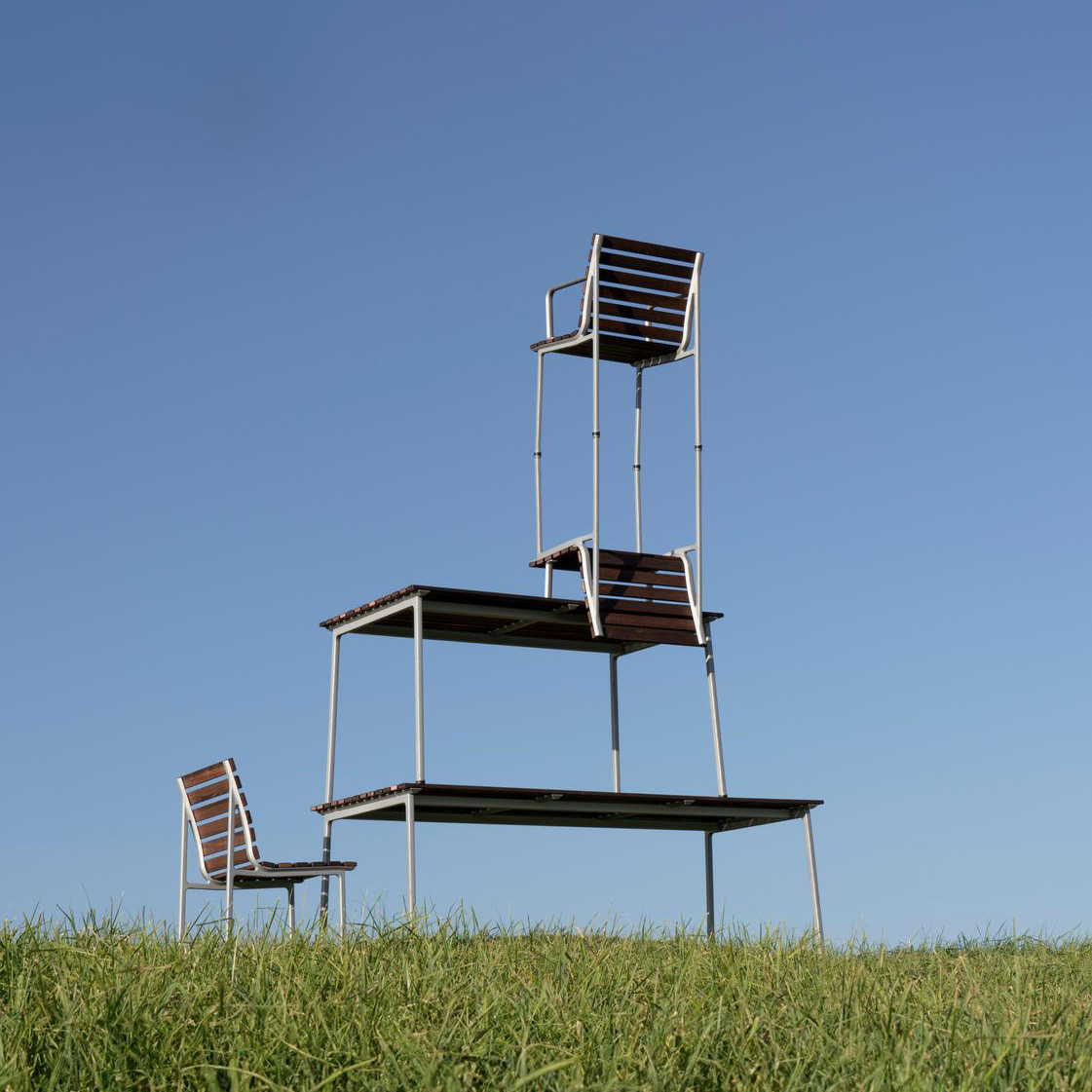 Complete Traverse Collection by HAY featuring chairs, armchairs, benches, stool and tables in harmonious arrangement