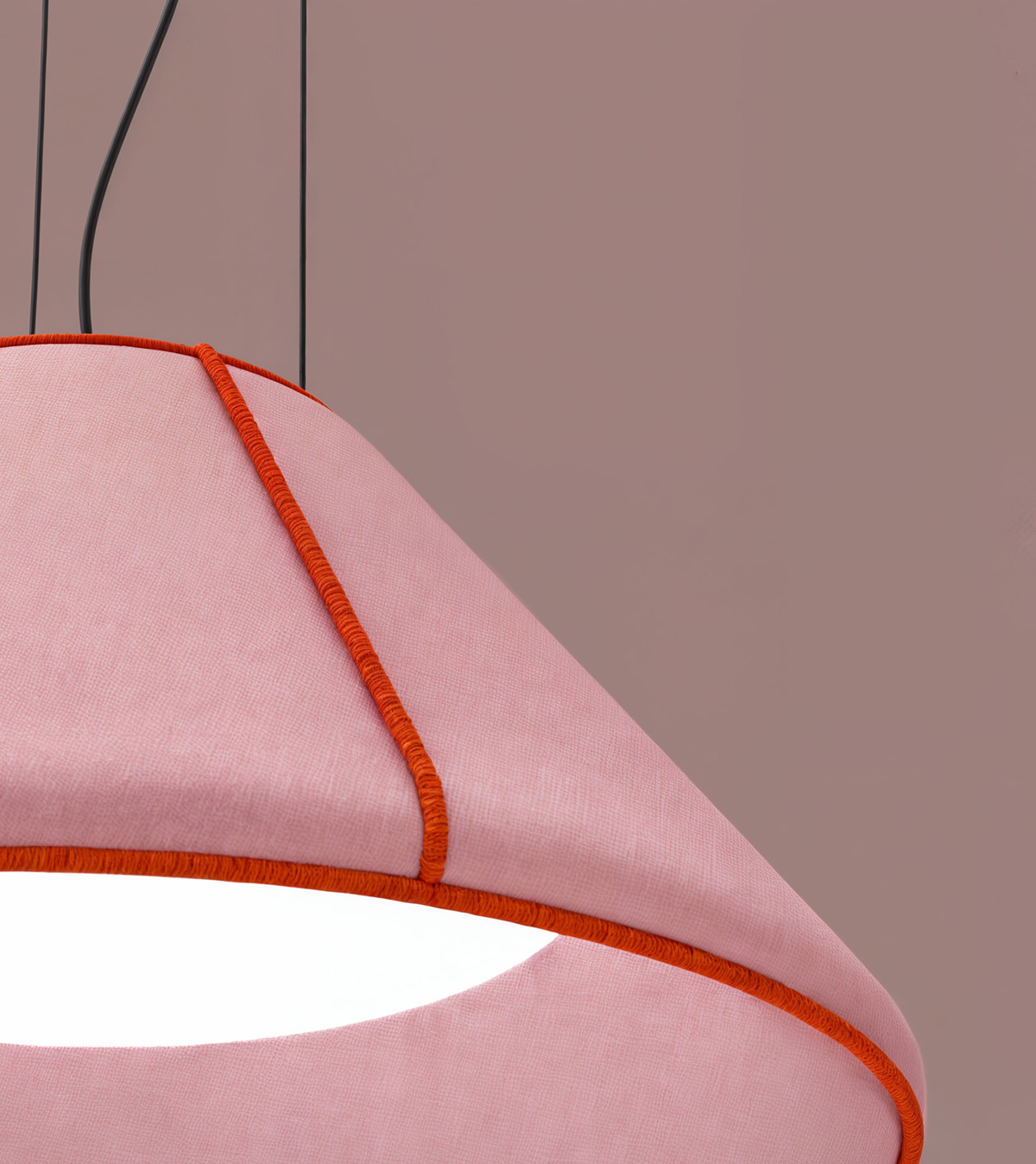 Close-up of SKETCH lamp's signature blanket stitching detail in yellow thread, showcasing hand-drawn design aesthetic