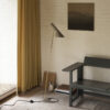 New editions of Arne Jacobsen classic lamp in black and warm grey by Louis Poulsen, featuring iconic Danish design elements