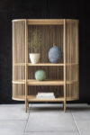 Bastone cabinet by Antrei Hartikainen featuring rhythmic wooden dowels, now part of Nikari's collection