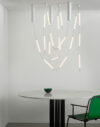 Normann Copenhagen's lighting collection featuring various configurations of the Reb Lamp designed by Verena Hennig alongside other pieces.