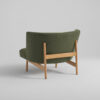Arcata lounge chair by Anderssen & Voll for Davis showing curved silhouette with exposed oak wood base design