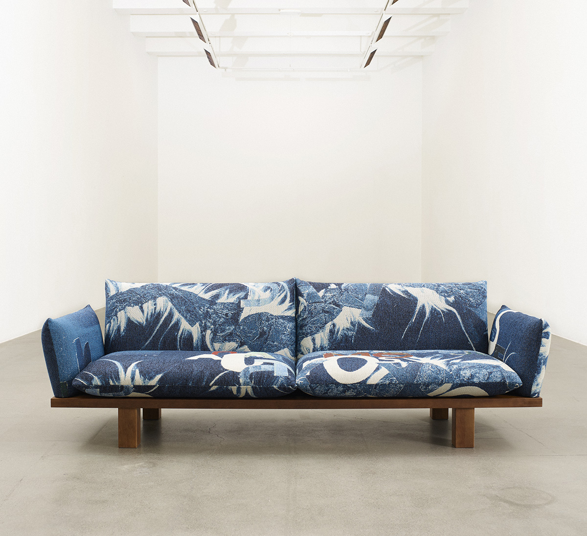 LK Hjelle Less sofa with Magne Furuholmen artistic textile in modern Norwegian living room setting