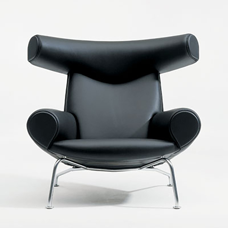 Hans J Wegner Ox Chair black leather Erik Jørgensen production showcasing sculptural design aesthetic