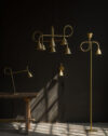 LOOP Family raw brass lighting collection by Jesper Ståhl for Konsthantverk Tyringe shown in modern interior