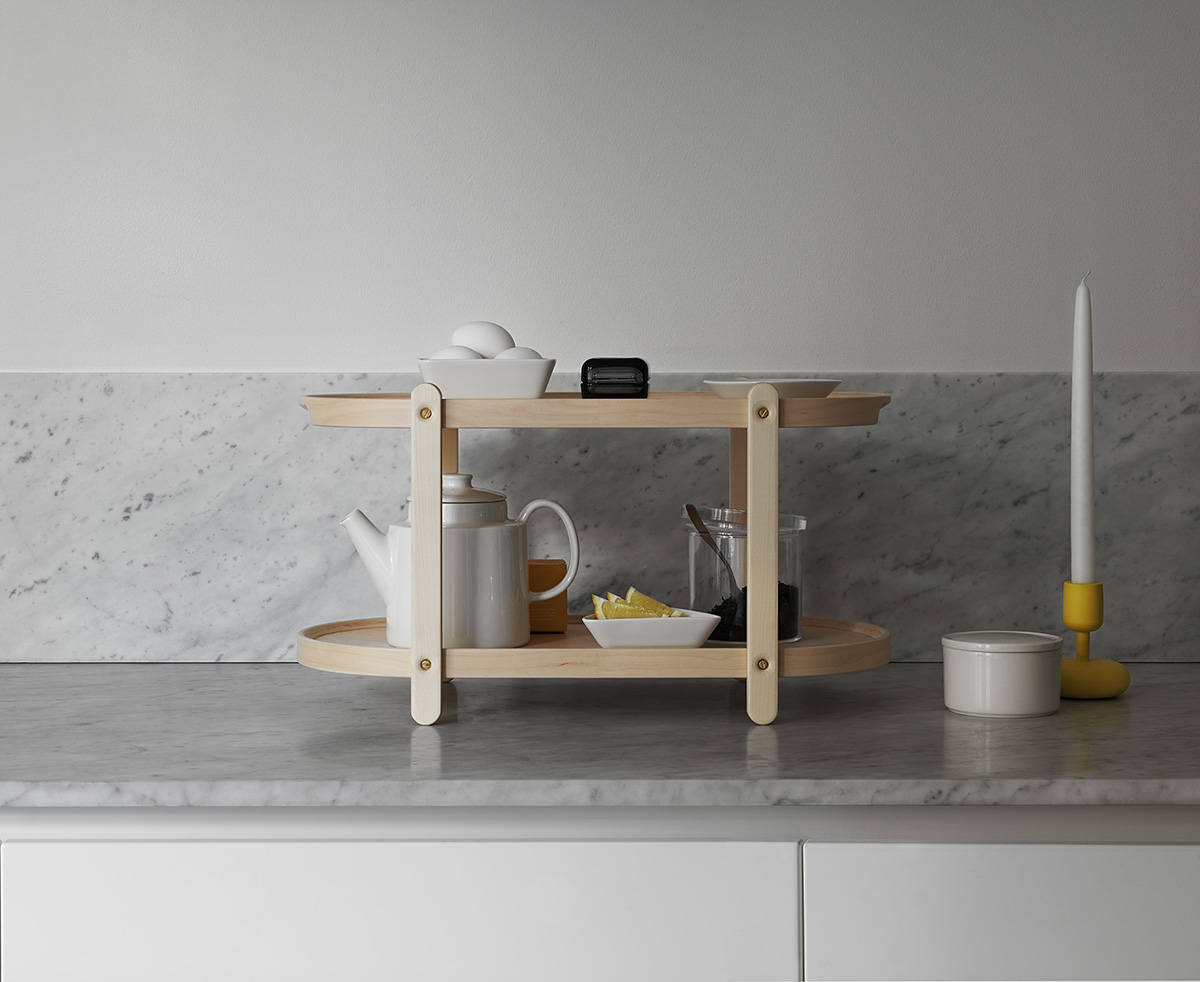 Kerros by Iittala used as serving tray and table for entertaining showing multi-purpose functionality