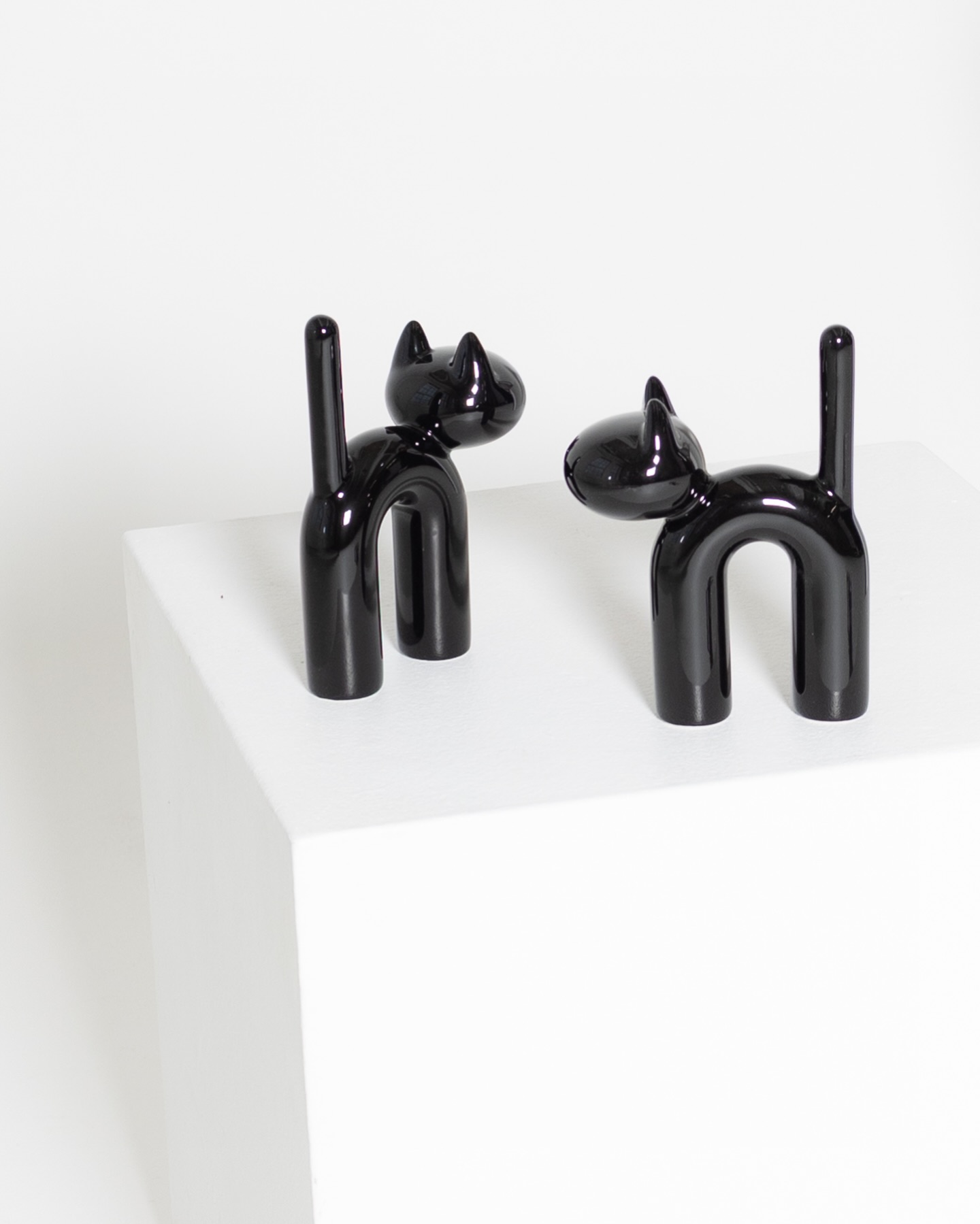 Shiny black finish detail of Mini KISU ceramic object by Eero Aarnio