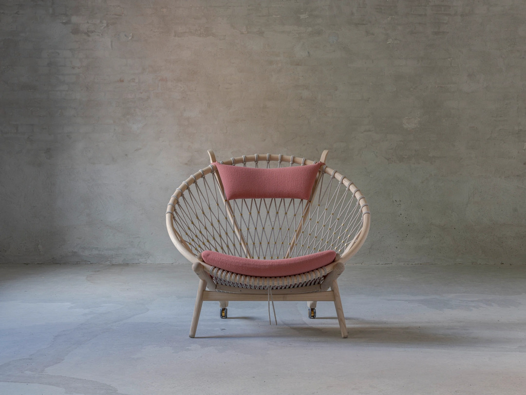Circle Chair by Hans J. Wegner, showing the distinctive woven seat and wooden frame structure
