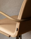 Close-up of the thin wooden armrest on Pierre Sindre’s Day Wood Armchair for Gärsnäs