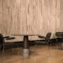 Fogia lifestyle image Flora Armchairs in Elmosoft 99999 leather and polished stainless steel at Maaemo Oslo 06